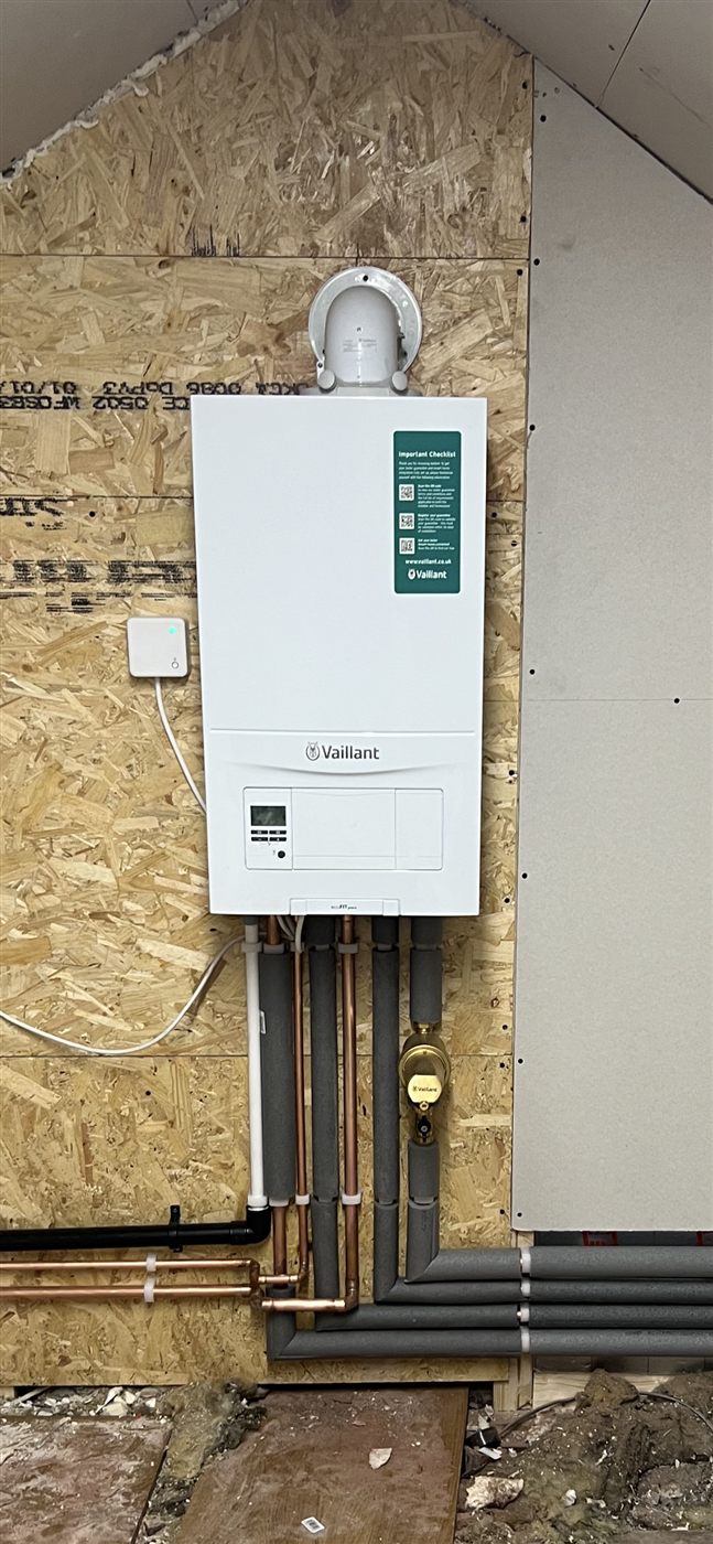 New Vaillant boiler installation with insulated pipework in a loft conversion